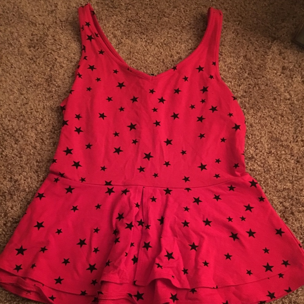 Express red with black stars peplum S/L top